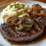 Ribeye Steak with Caramelized Onions and Mashed Potatoes