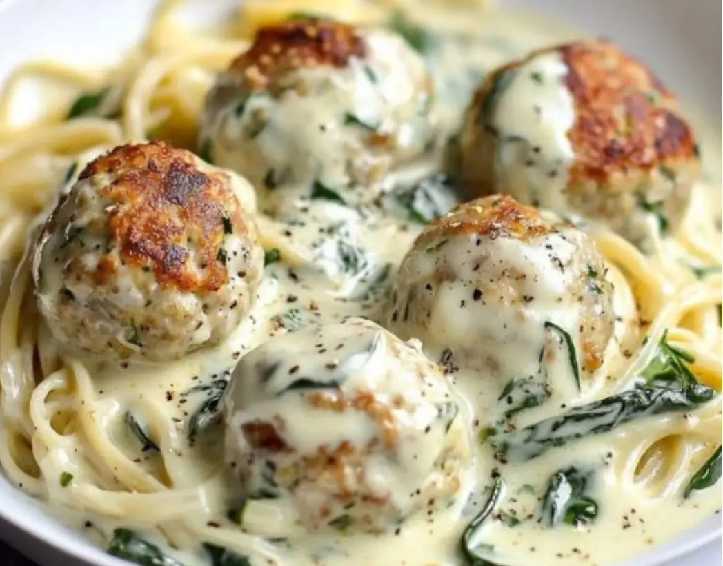 Creamy Chicken Meatballs with Spinach Alfredo Sauce