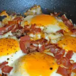 Skillet Baked Eggs with Ham and Cheese