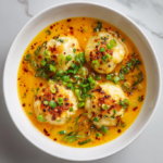 Crispy Arancini with Parmesan Cream Sauce and Microgreens: An Italian Appetizer Favorite