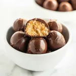 Dark Chocolate Almond Joy Truffles Filled with Toasted Almonds and Coconut