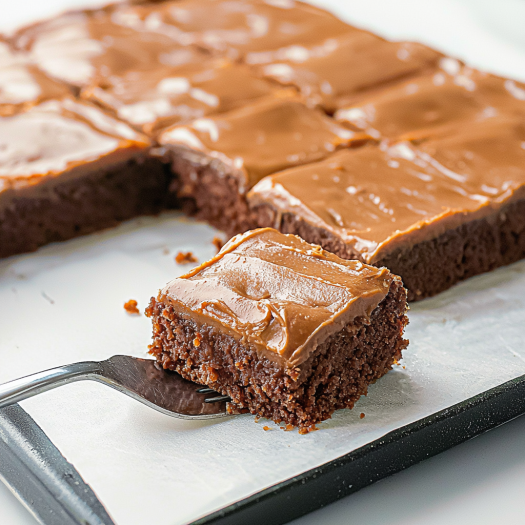 Classic Texas Sheet Cake: Rich and Moist Chocolate Sheet Cake with a Warm Fudge Frosting – A Beloved Southern Dessert Tradition